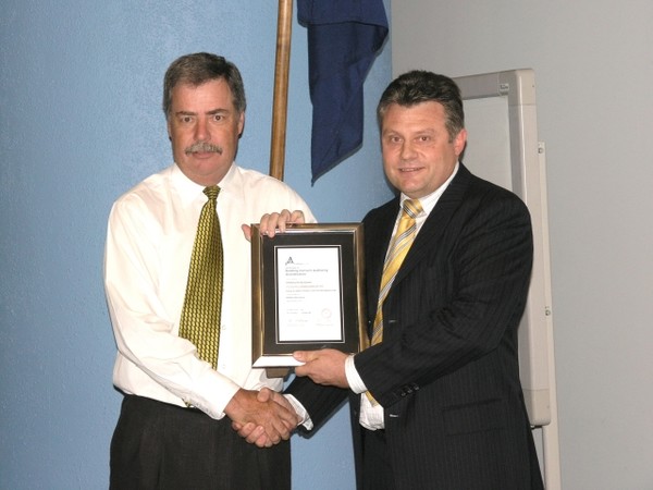 Christchurch City Council CEO Tony Marryatt receives the Accreditation certificate from Andrew Minturn (Adviser, BCA Accreditation & Registration)